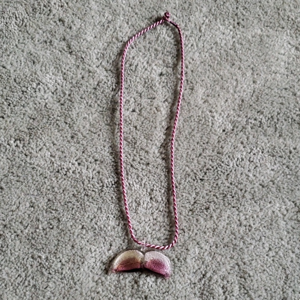 NWOT lavender glass whale tail necklace